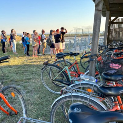 Pedalling with sunset aperitif